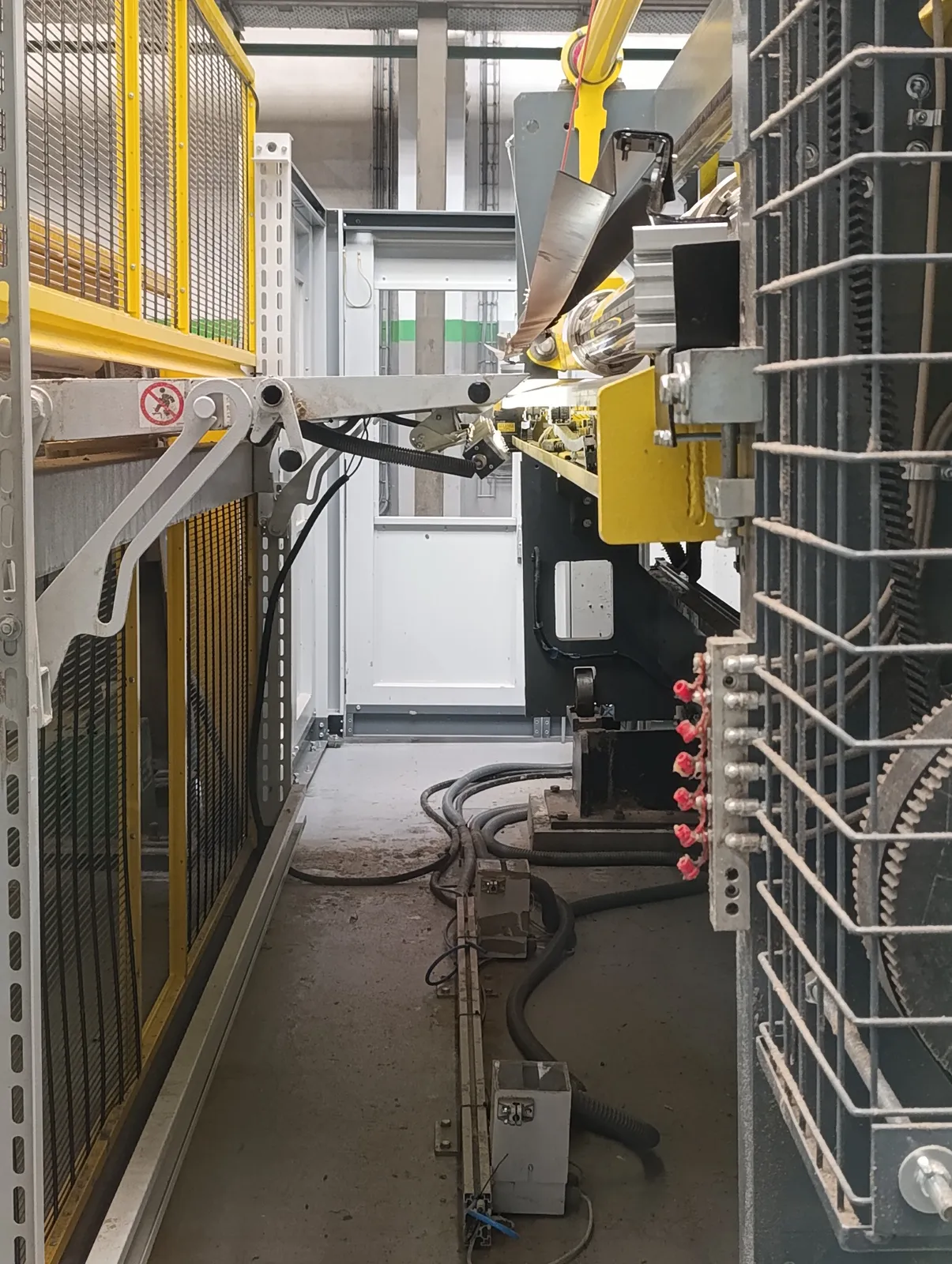 Corrugated board production line with sheet handling and illuminated inspection area