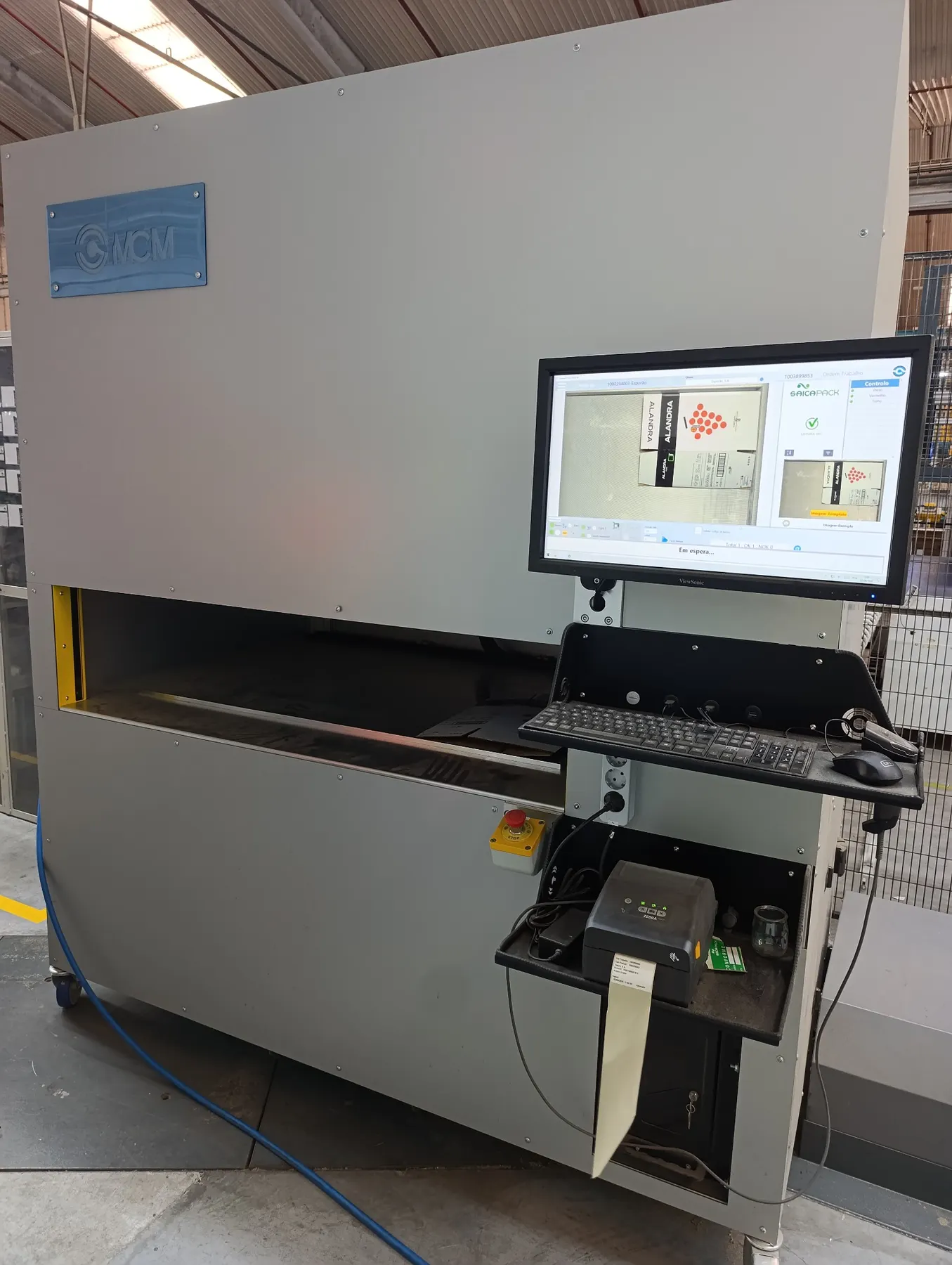 MCM Industrial Scanner for packaging quality control with operator interface in a real production environment
