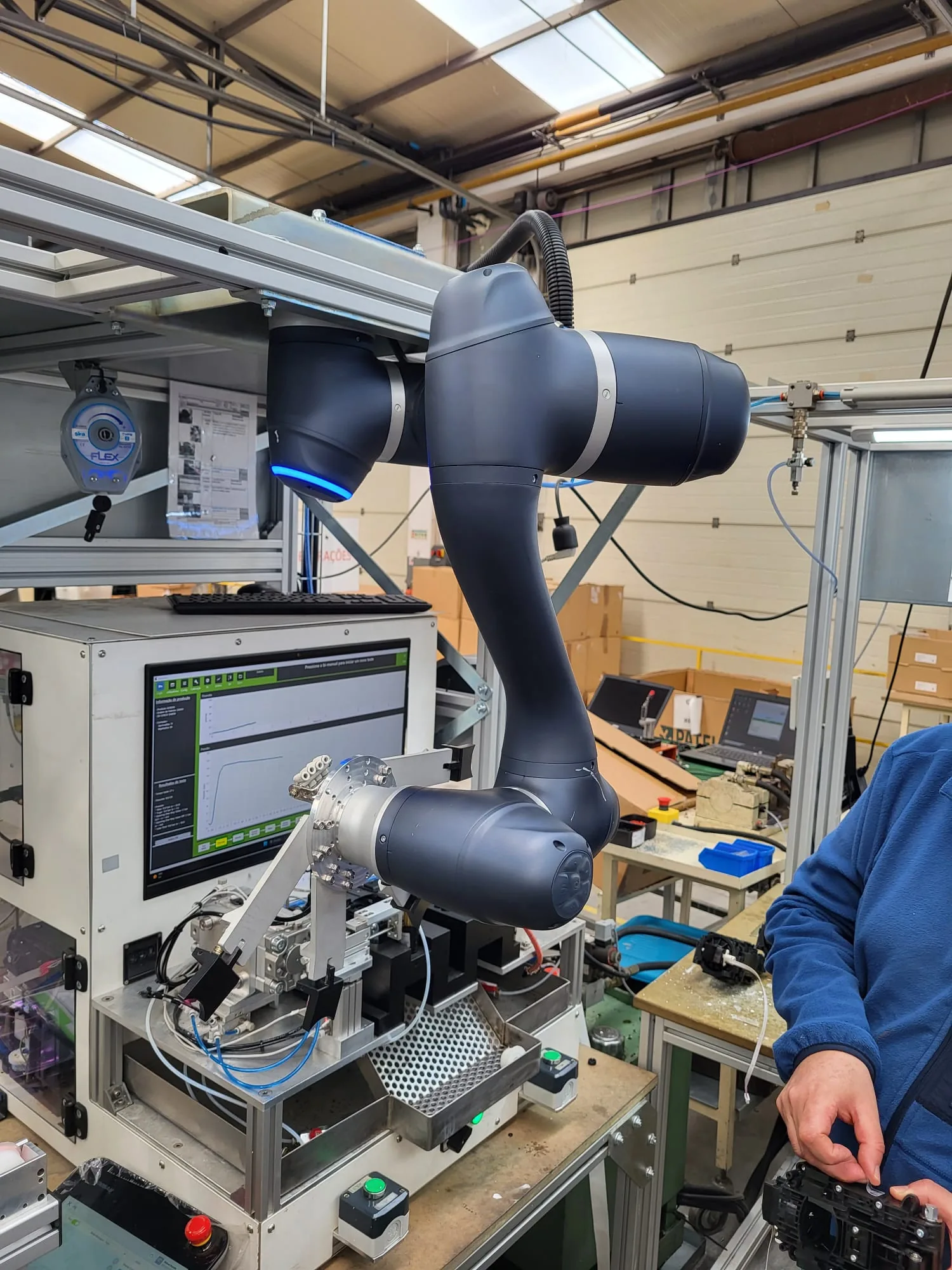 MCM robot-assisted industrial test station with fixture, instrumentation and HMI